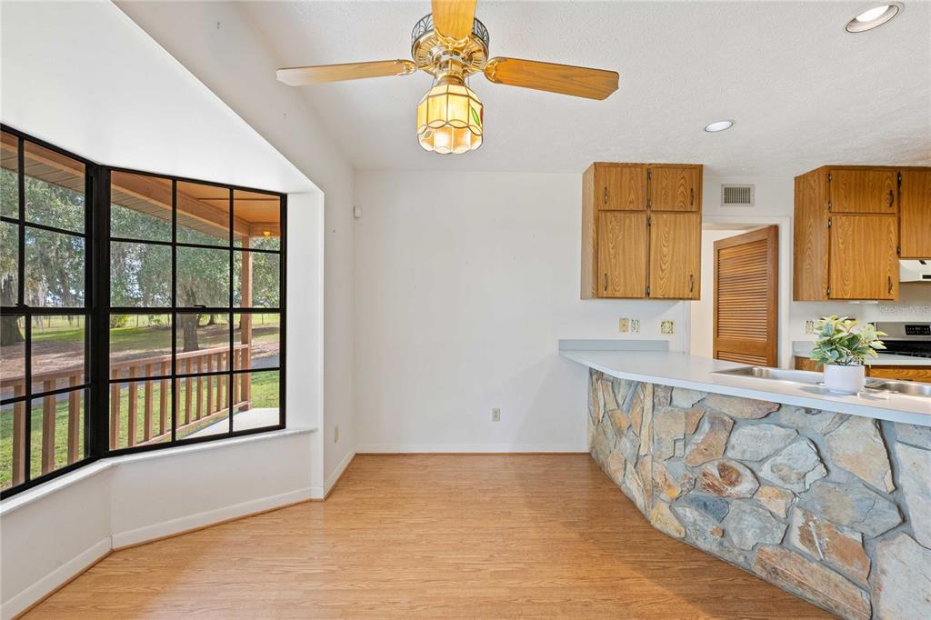 14835 Ramsey Road Dade City, FL 33523 - Photo 24 of 59 a view of a bathroom with dual sinks