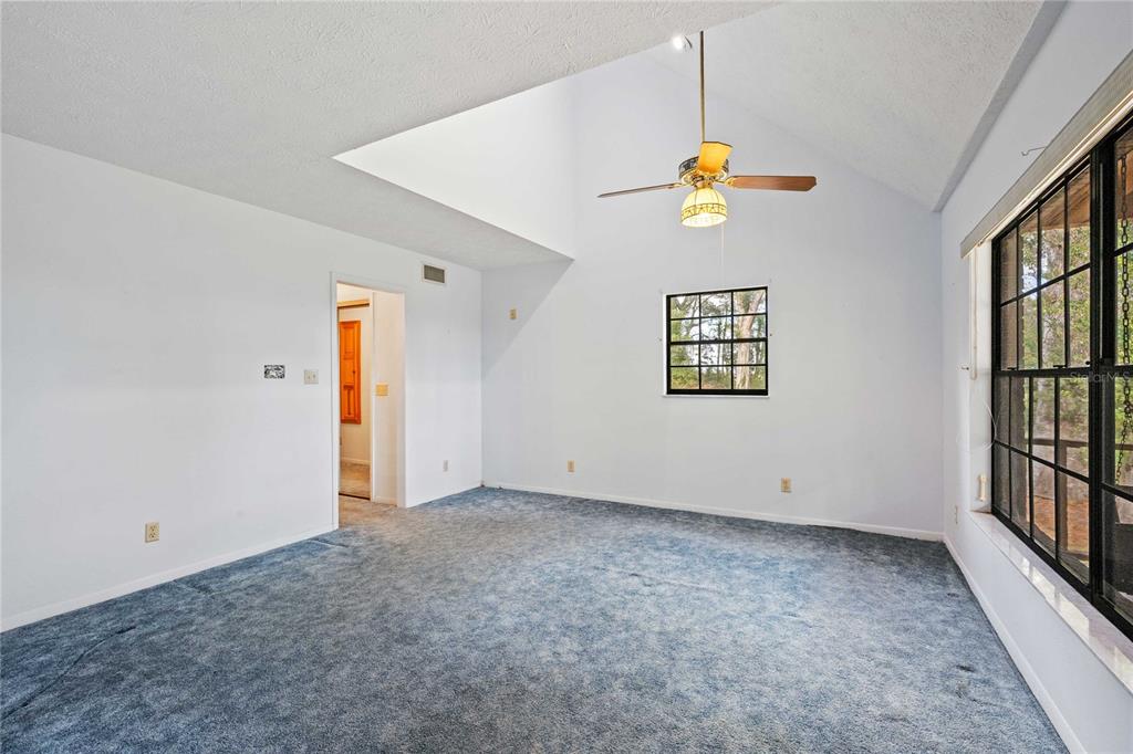 14835 Ramsey Road Dade City, FL 33523 - Photo 29 of 59 a view of an entryway with wooden floor
