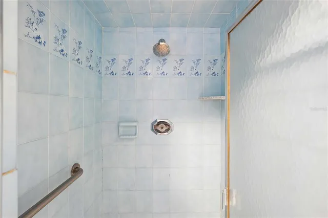 a aerial view of a house with a yard