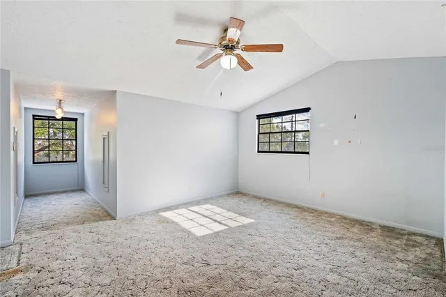 a view of house with swimming pool