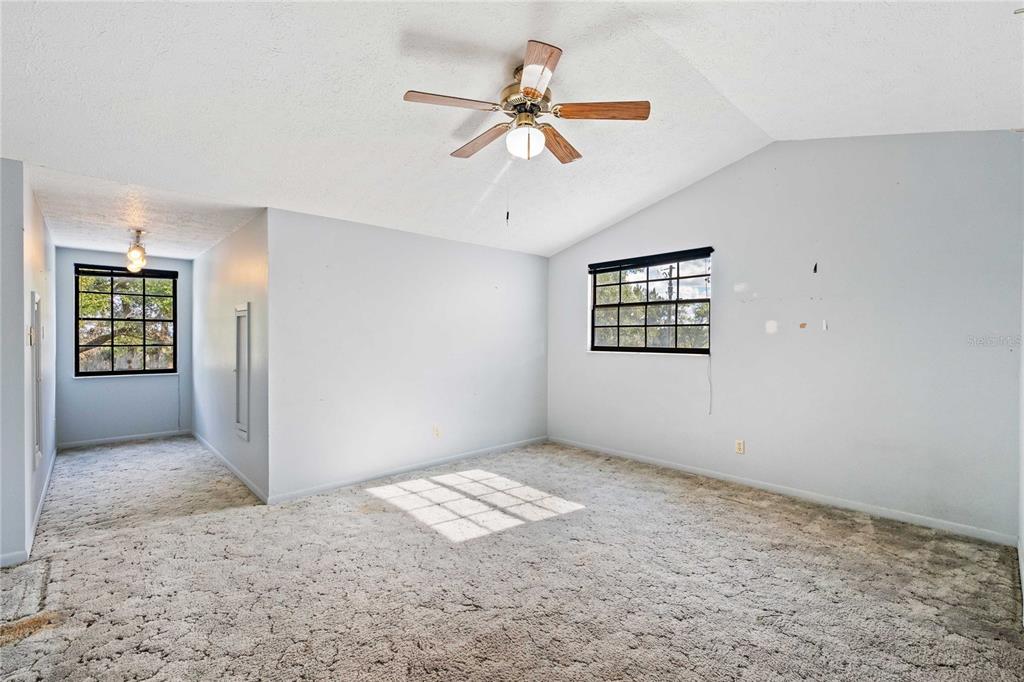 14835 Ramsey Road Dade City, FL 33523 - Photo 40 of 59 a view of an empty room with a window