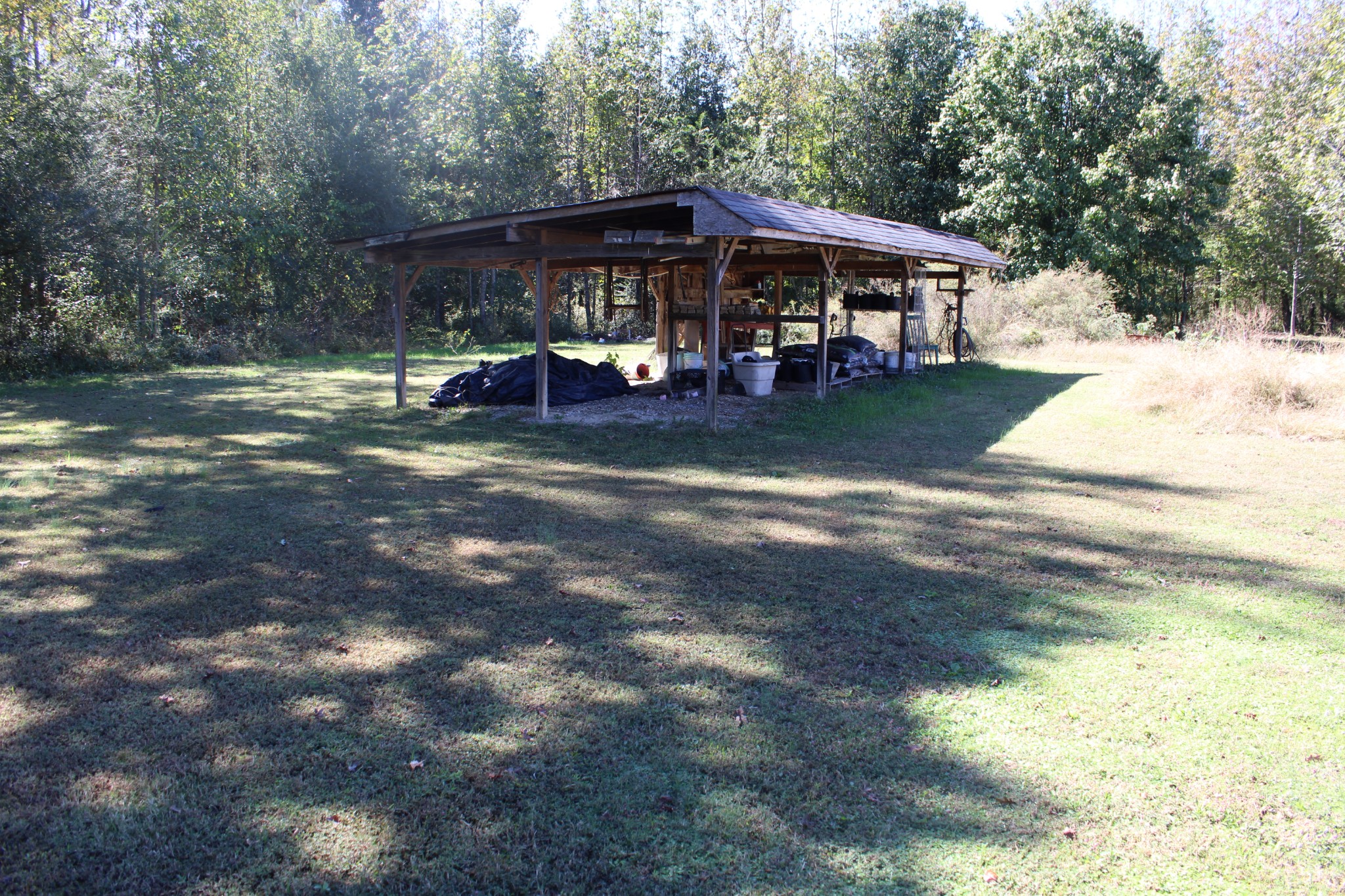 24994 7th Street Ardmore, AL 35739 - Photo 3 of 11 a view of a chairs and tables in the patio of a house