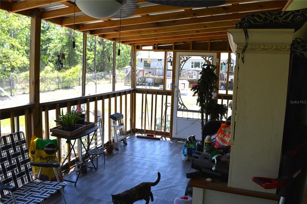 2640 Northeast 74th Street High Springs, FL 32643 - Photo 21 of 39 a view of a porch with furniture