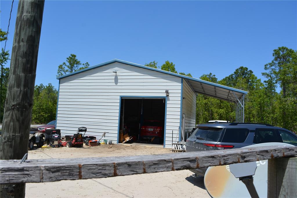 2640 Northeast 74th Street High Springs, FL 32643 - Photo 29 of 39 a backyard of a house with seating space