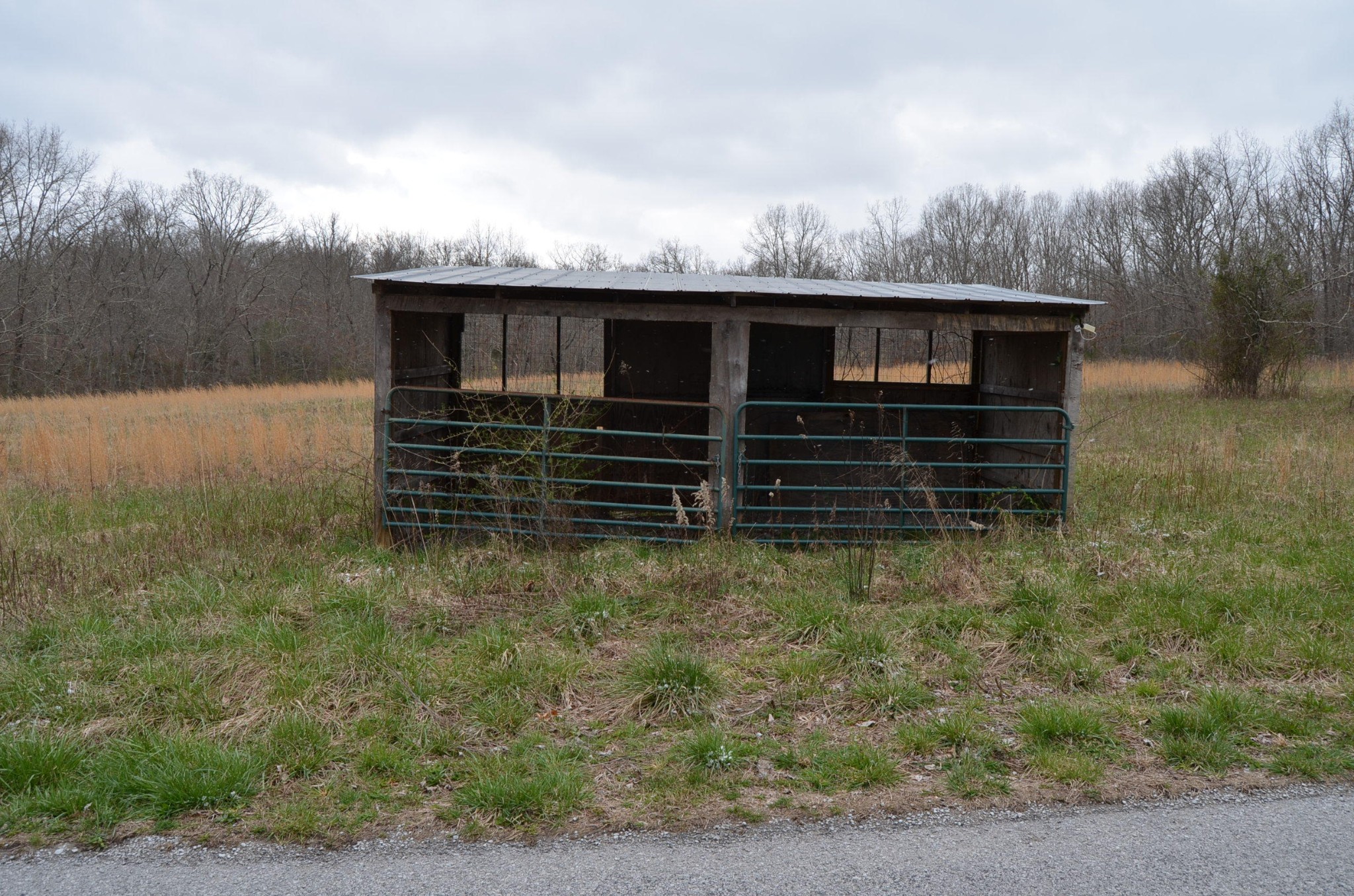 0 Parnell Road Crossville, TN 38572 - Photo 1 of 23 a view of a house with a yard and wooden fence