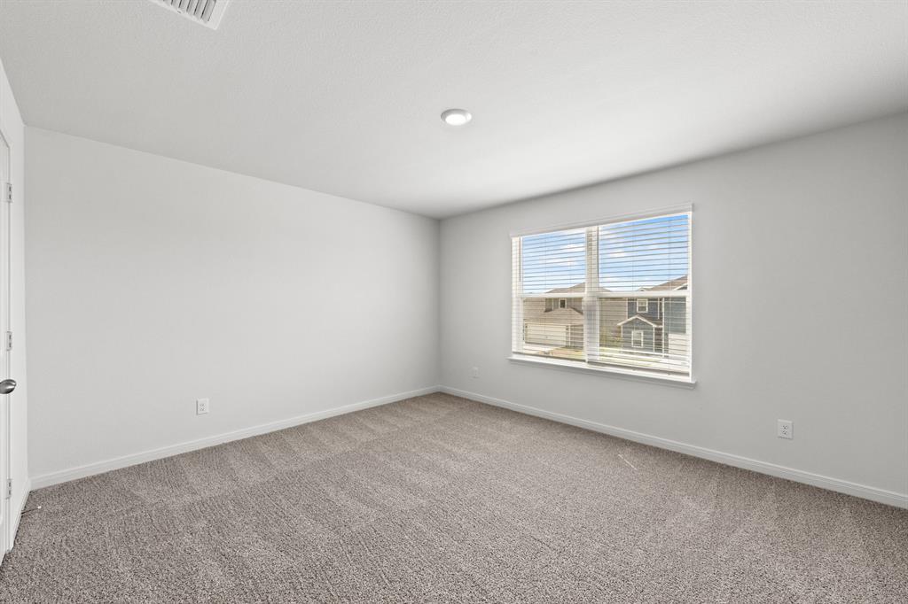 8420 Wibaux Road Ponder, TX 76259 - Photo 9 of 9 an empty room with a window
