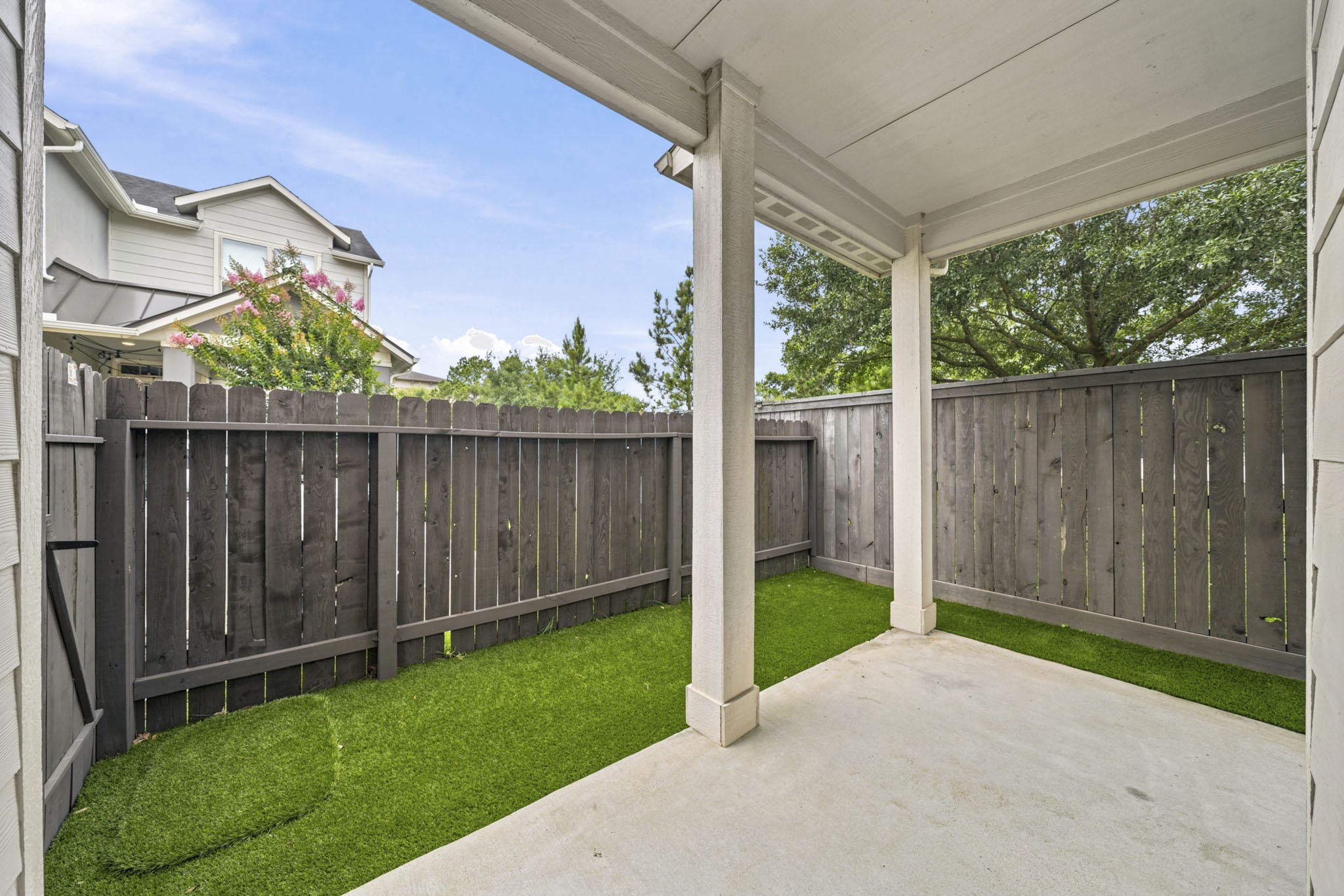4103 Tranquil Square Road Houston, TX 77043 - Photo 36 of 39 Begin your mornings with coffee and unwind in the evenings beneath the comfort of this inviting private covered patio with no neighbors behind.