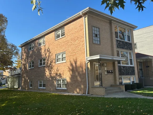 a front view of house with yard