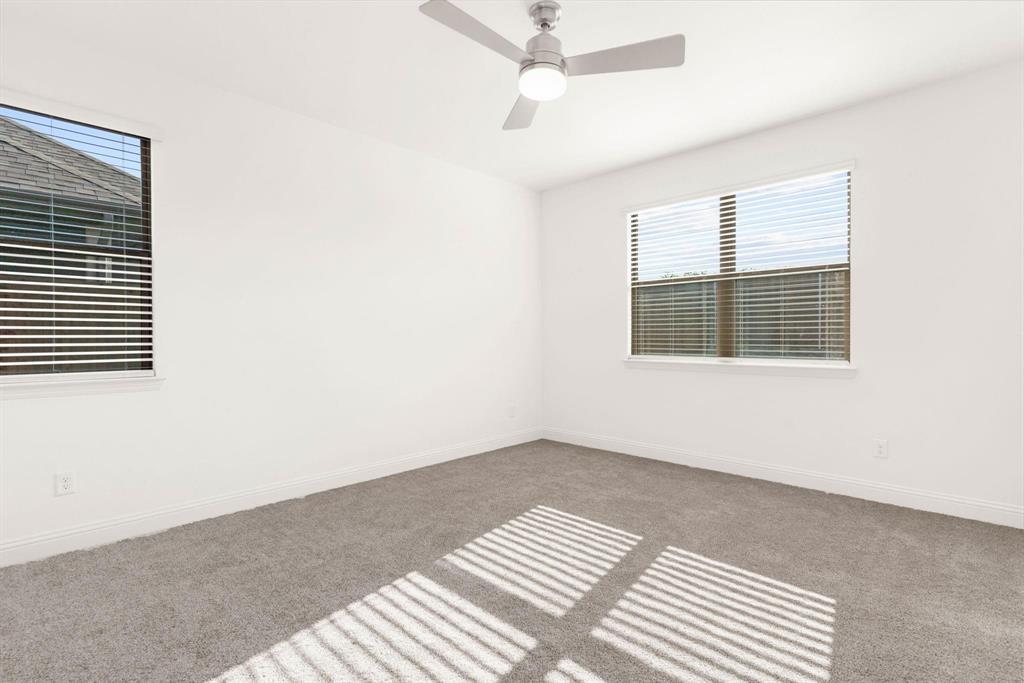 216 Town Pk Avenue Princeton, TX 75407 - Photo 17 of 19 a view of an empty room with a window