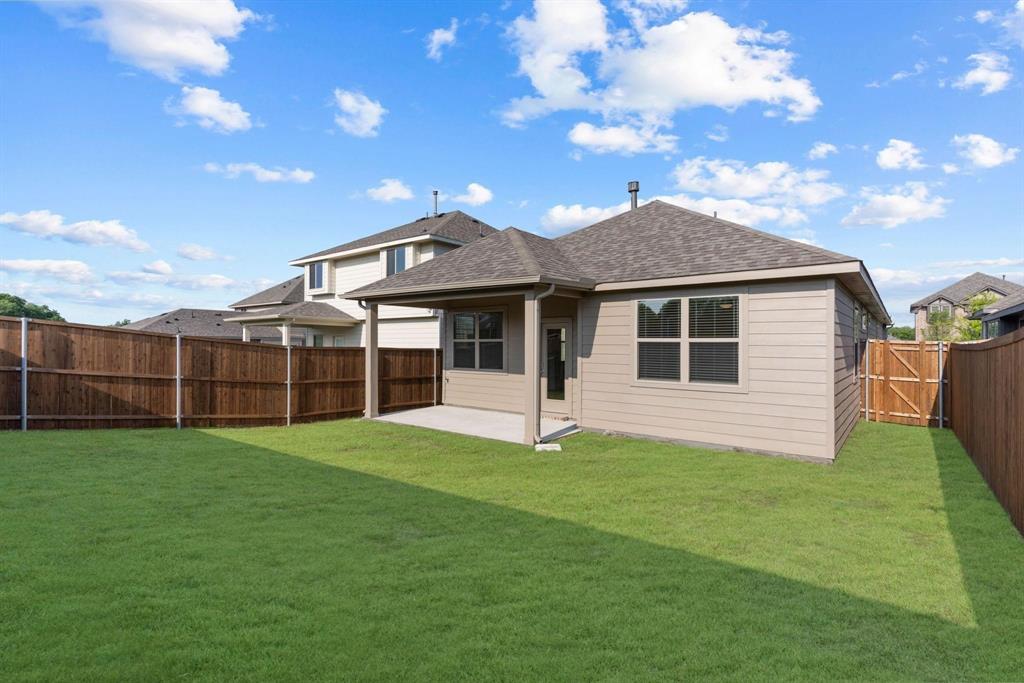 216 Town Pk Avenue Princeton, TX 75407 - Photo 19 of 19 a view of a house with a yard and sitting area