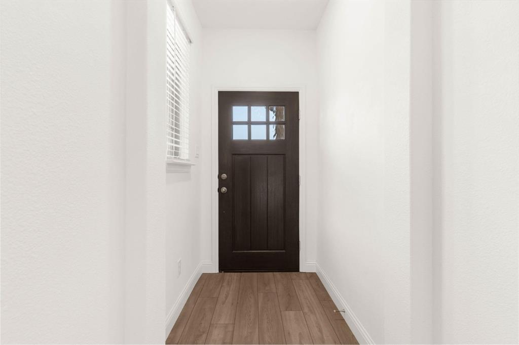 216 Town Pk Avenue Princeton, TX 75407 - Photo 2 of 19 a view of a hallway