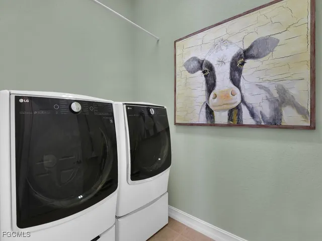 a utility room with dryer and washer