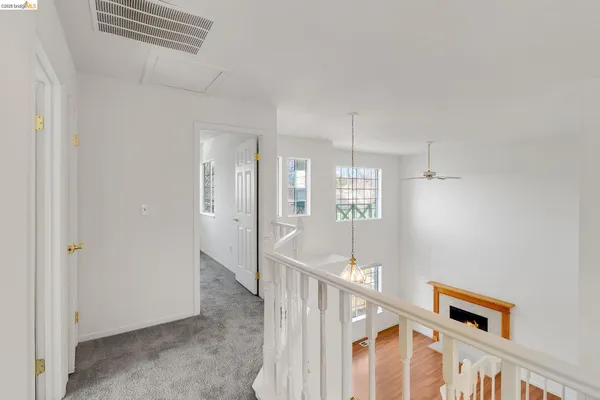 a bathroom with a toilet and a tub