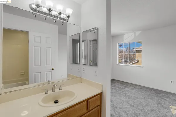 a view of a livingroom with an empty space and window