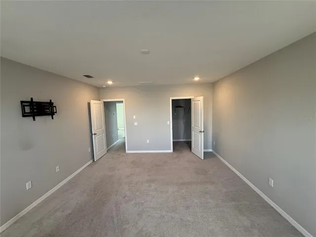 a view of a livingroom with a staircase