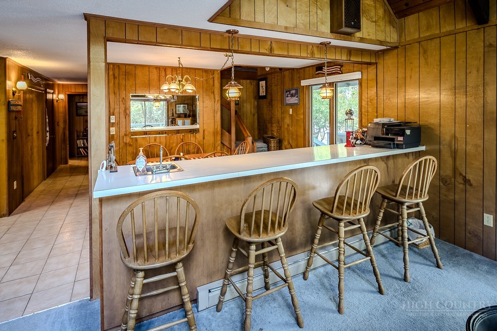 107-109 Shagbark Road Beech Mountain, NC 28604 - Photo 14 of 45 a dining room with furniture and window