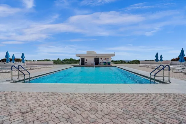 a view of balcony with furniture
