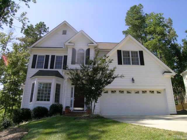 6721 Hammersmith Drive Raleigh, NC 27613 - Photo 1 of 1 a front view of a house with a yard and garage
