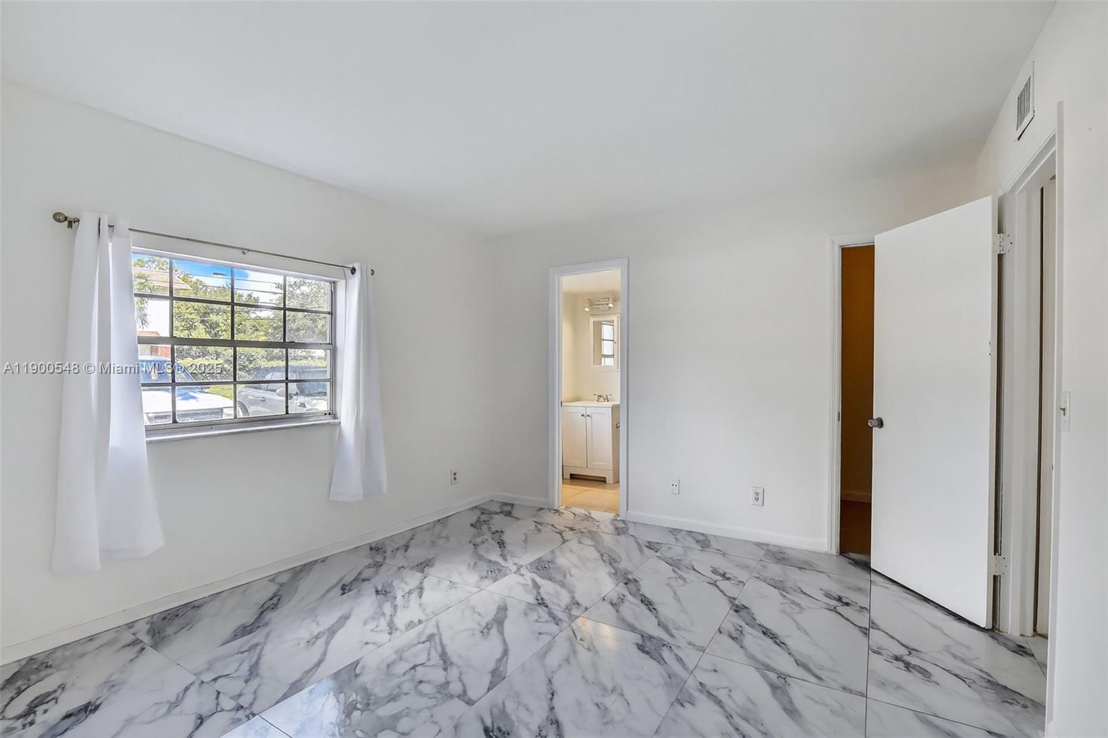 1405 Miami Road, Unit 5 Fort Lauderdale, FL 33316 - Photo 16 of 25 a view of room with window