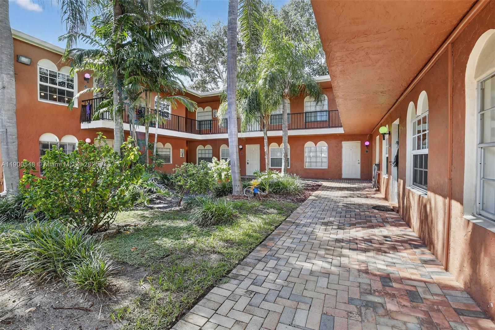 1405 Miami Road, Unit 5 Fort Lauderdale, FL 33316 - Photo 19 of 25 a view of a pathway both side of house