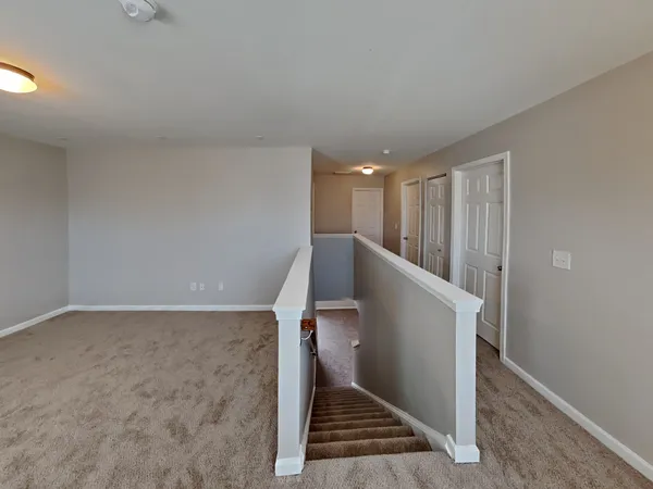 a view of entryway with stairs