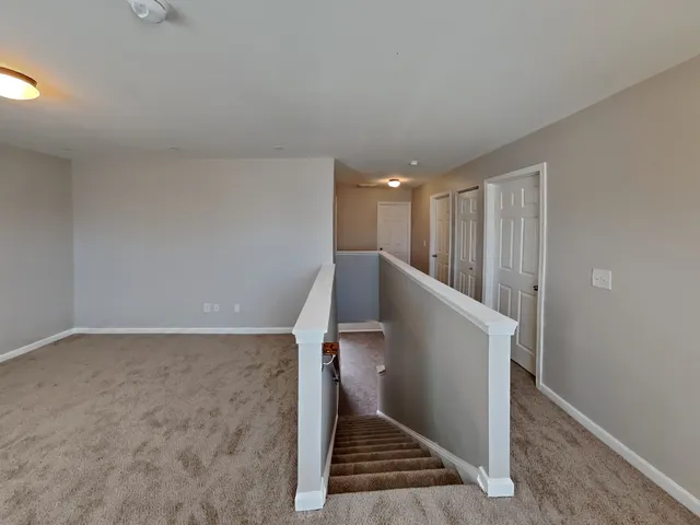 a view of entryway with stairs