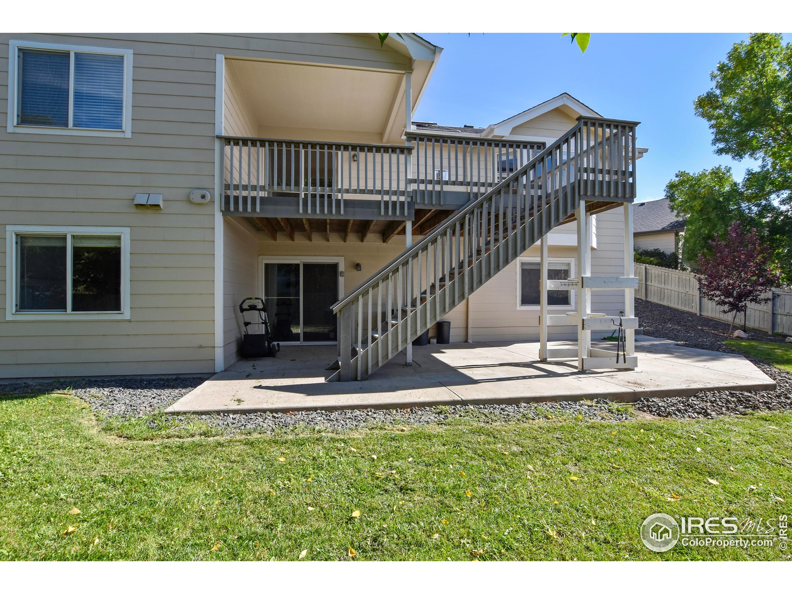 205 Timber Ridge Court Severance, CO 80550 - Photo 45 of 48 a view of a house with a yard