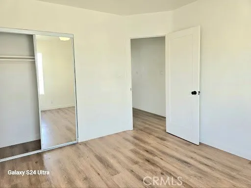 a bathroom with a shower sink and mirror
