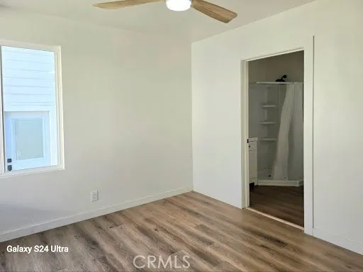 a bathroom with a sink vanity and a mirror
