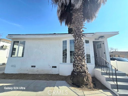 1350 East 94th Street Los Angeles, CA 90002 - Photo 2 of 15 a front view of a house
