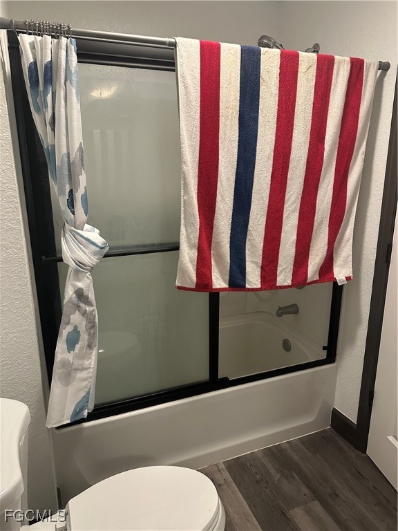 1208 East Maple Street Arcadia, FL 34266 - Photo 26 of 30 a bathroom with a toilet and a shower