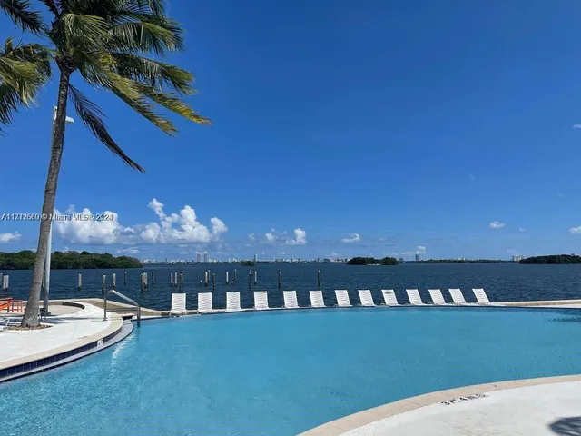 a view of a balcony with an ocean view
