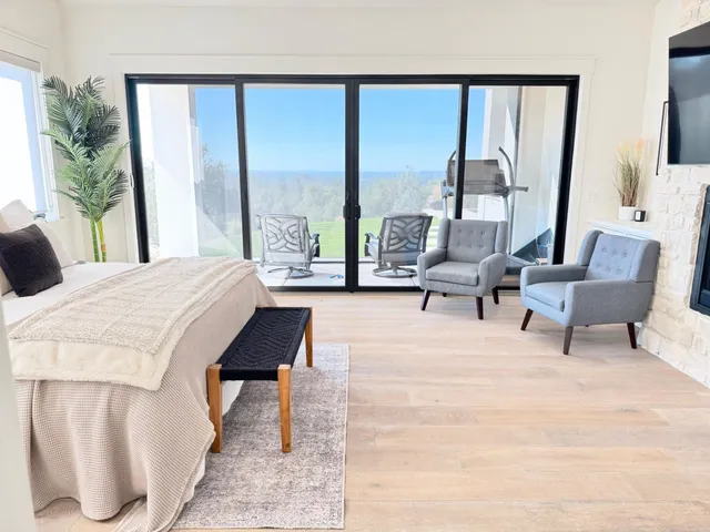 a kitchen with a sink and a stove top oven