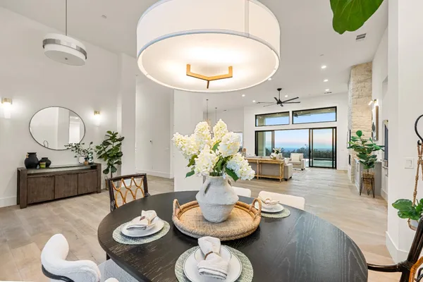 a kitchen with stainless steel appliances a refrigerator and stove