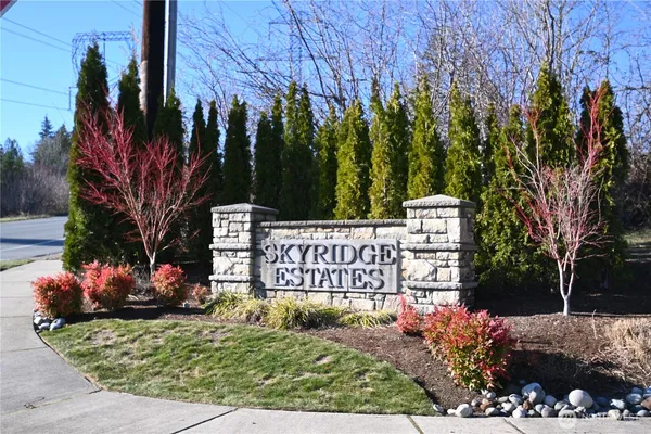 a sign on the side of the road