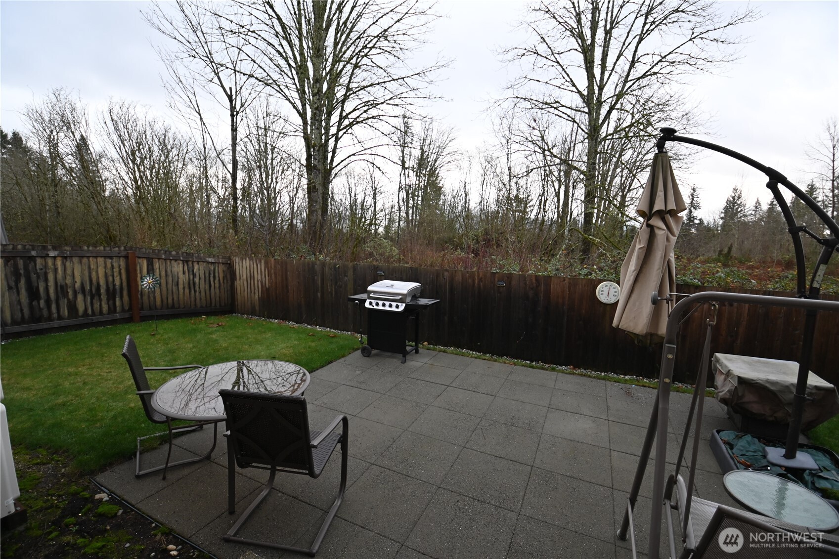 31620 Winston Street Southeast Sultan, WA 98294 - Photo 4 of 22 a view of a chairs in backyard of house