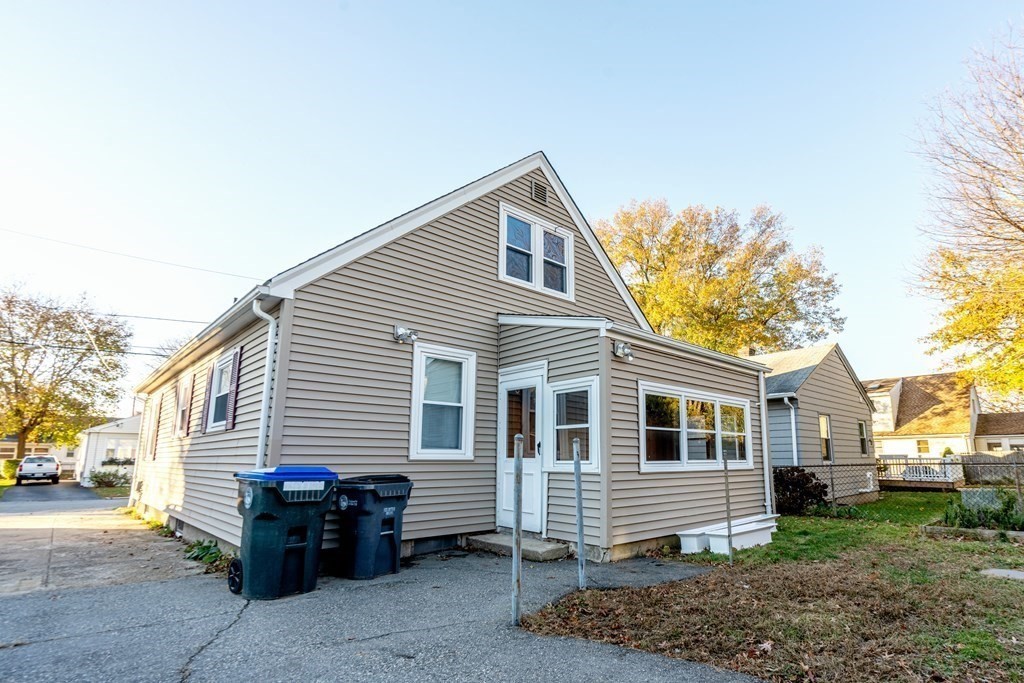 95 Rome Avenue Providence, RI 02908 - Photo 14 of 15 a view of a house with a backyard