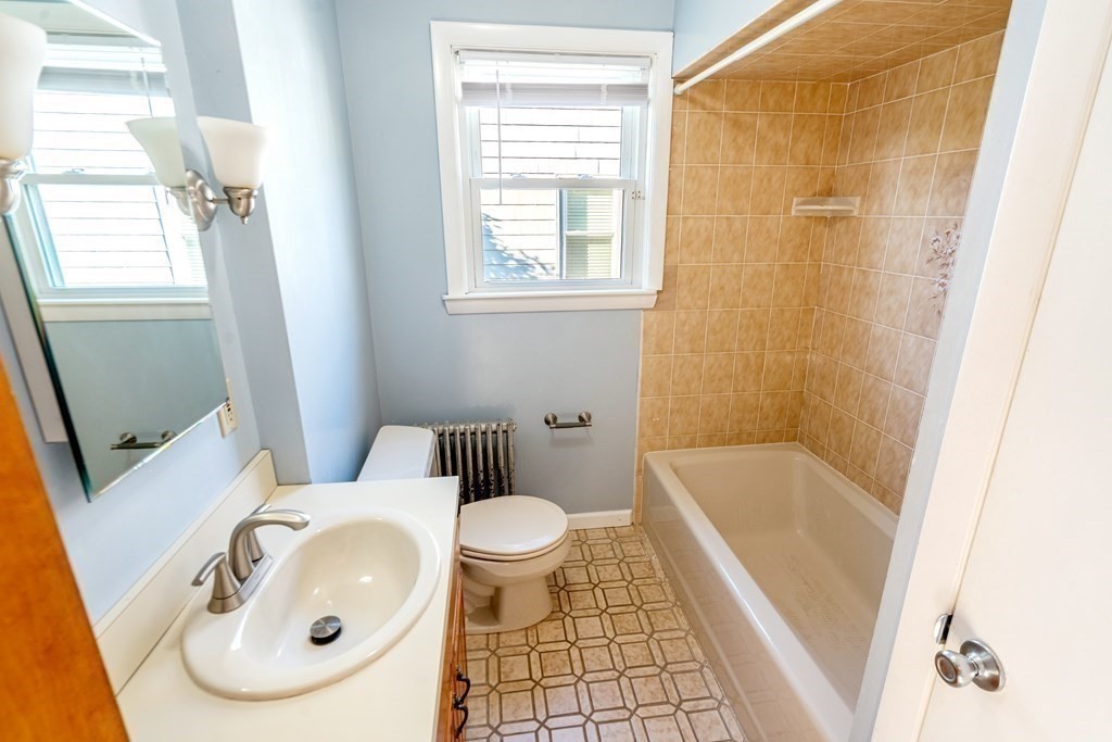 95 Rome Avenue Providence, RI 02908 - Photo 8 of 15 a bathroom with a sink toilet and shower