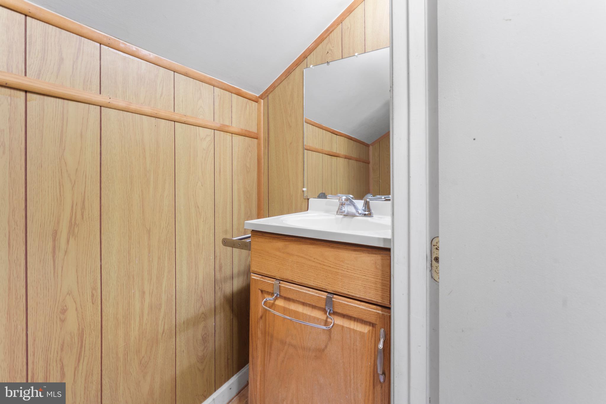 9707 Braddock Road Silver Spring, MD 20903 - Photo 20 of 32 upper level half bath