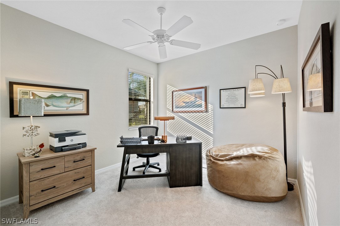 19729 Beechcrest Place Estero, FL 33928 - Photo 25 of 45 a room with furniture and window