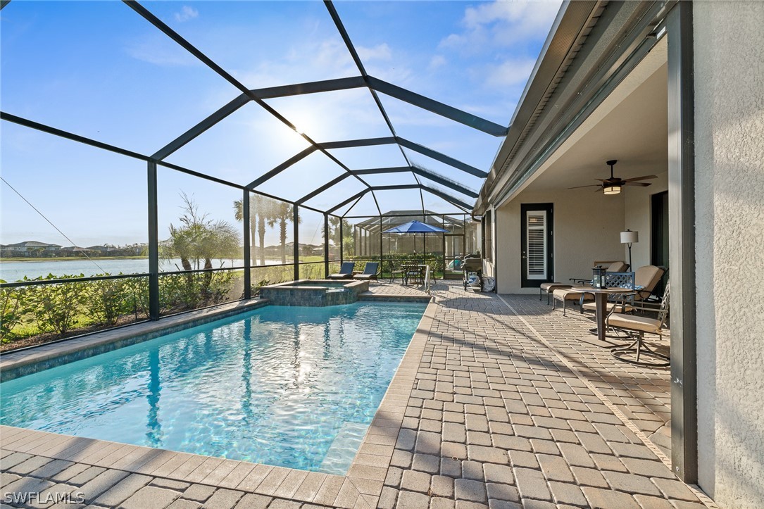 19729 Beechcrest Place Estero, FL 33928 - Photo 31 of 45 a view of swimming pool with seating area