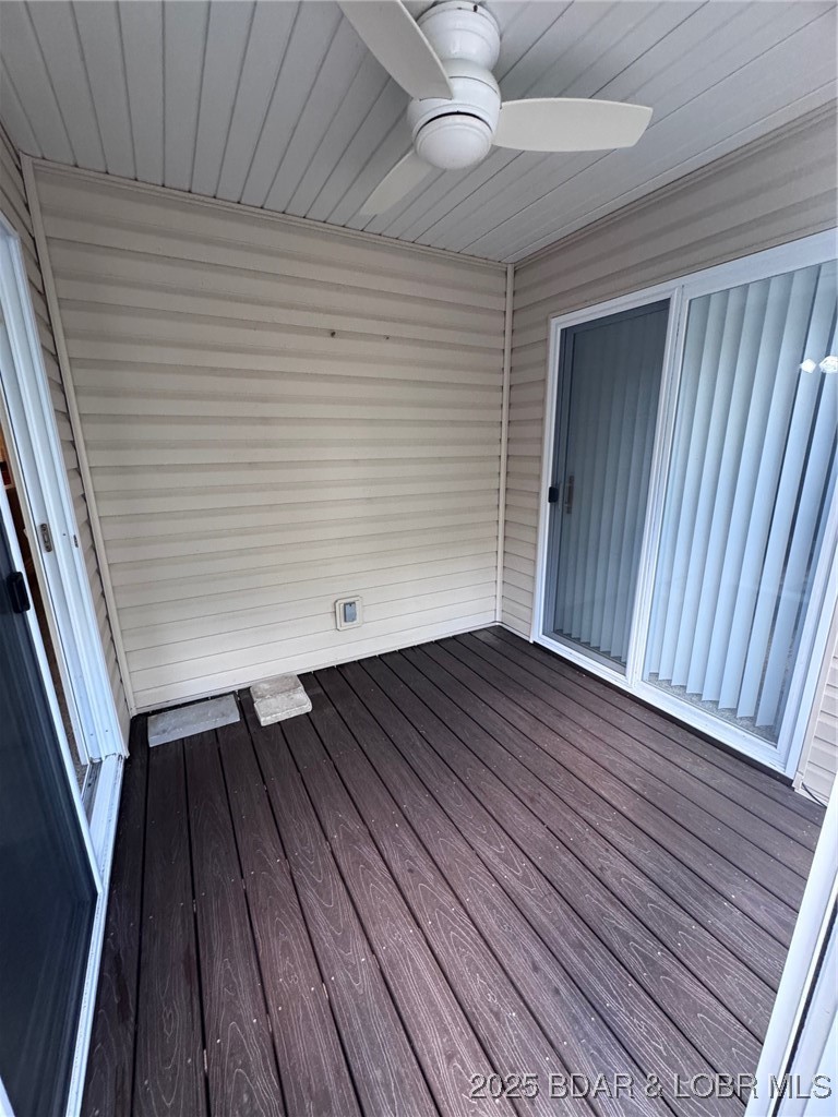 4331 Sunset Drive, Unit B Osage Beach, MO 65065 - Photo 4 of 36 Screened in deck off living area