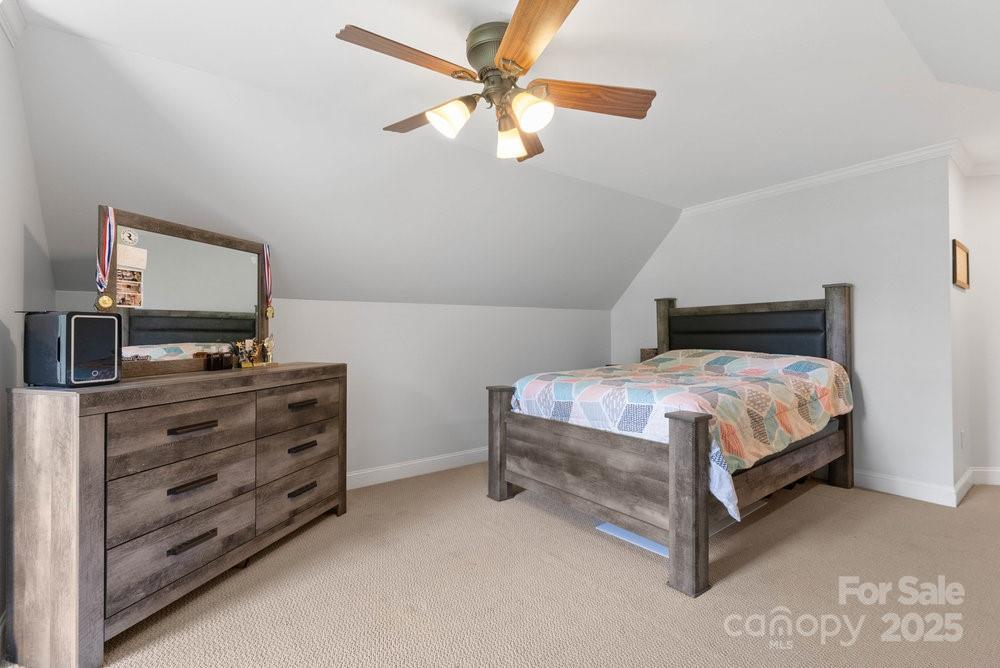 134 Brightmore Circle Rutherfordton, NC 28139 - Photo 16 of 40 a bedroom with a bed and a flat screen tv