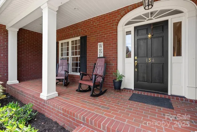 a view of a entryway door with seating space