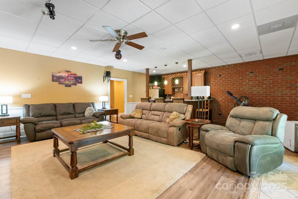 134 Brightmore Circle Rutherfordton, NC 28139 - Photo 21 of 40 a living room with furniture and a large window