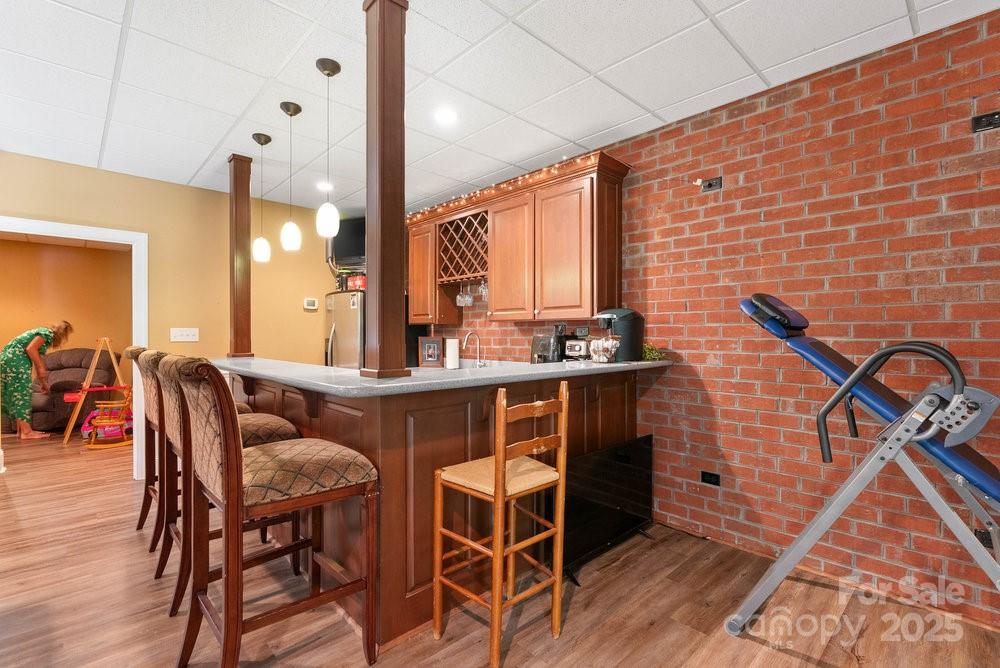 134 Brightmore Circle Rutherfordton, NC 28139 - Photo 23 of 40 a dining room with furniture and wooden floor