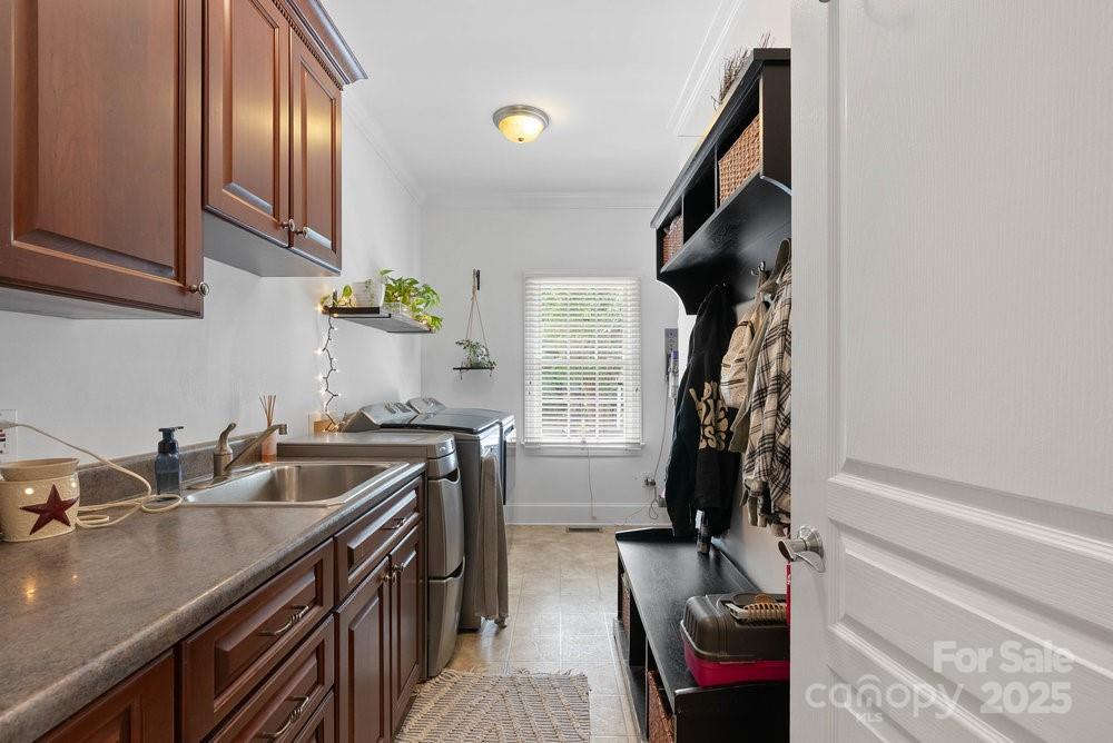 134 Brightmore Circle Rutherfordton, NC 28139 - Photo 28 of 40 a kitchen with a sink stove and cabinets