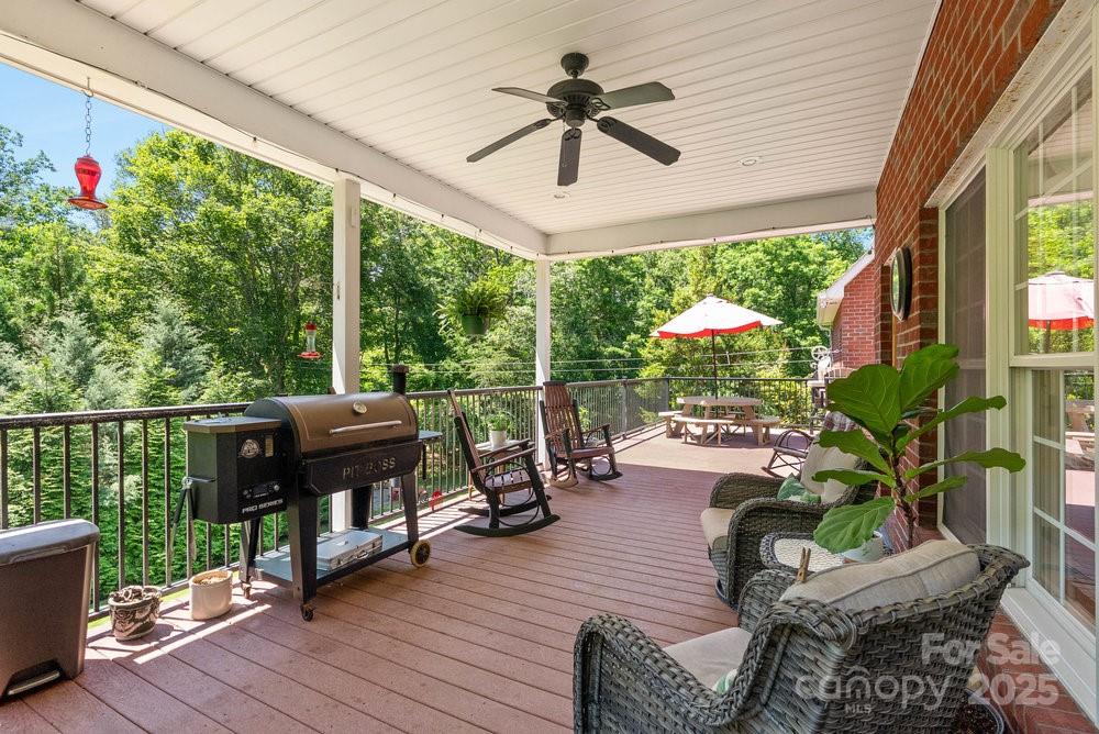 134 Brightmore Circle Rutherfordton, NC 28139 - Photo 29 of 40 a view of a porch with furniture and a backyard