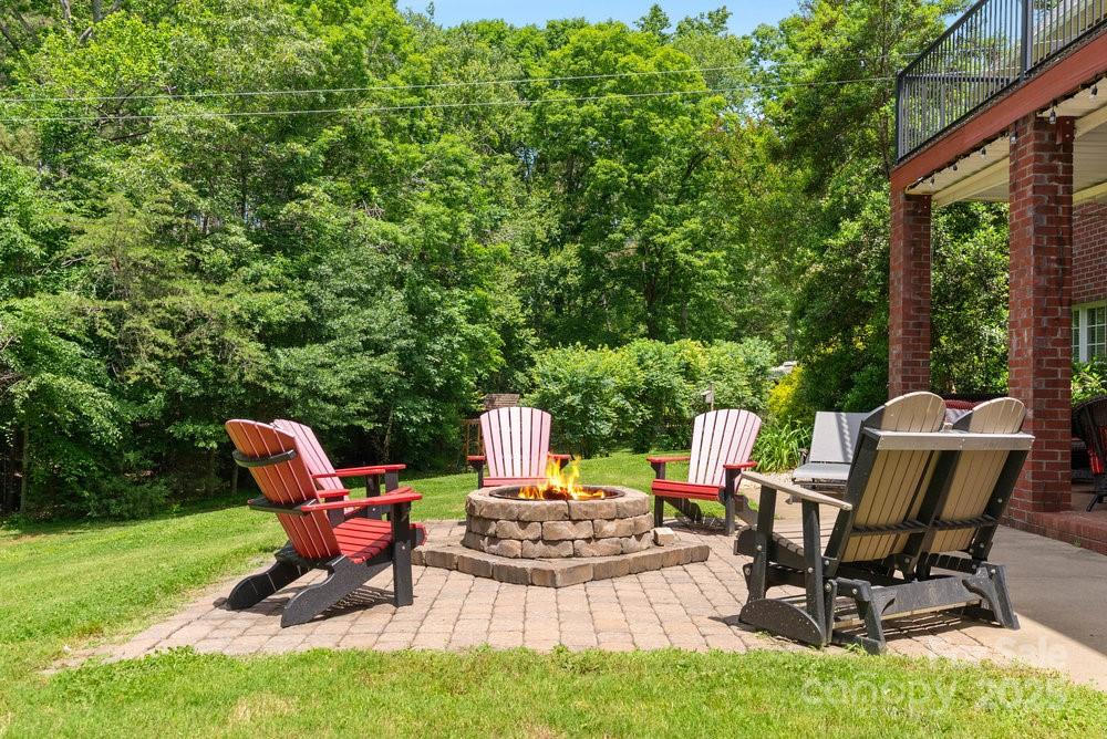 134 Brightmore Circle Rutherfordton, NC 28139 - Photo 34 of 40 a view of a patio with chair and table and chairs