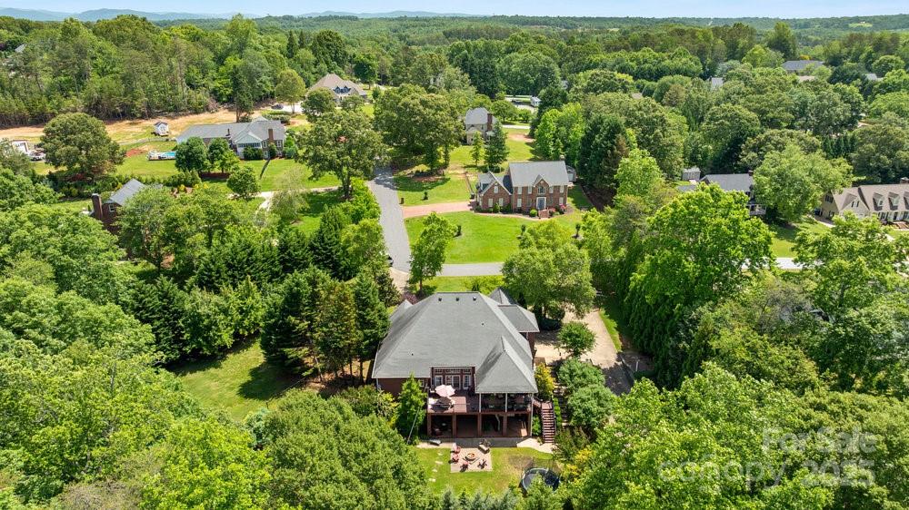 134 Brightmore Circle Rutherfordton, NC 28139 - Photo 37 of 40 an aerial view of a house with yard and outdoor seating